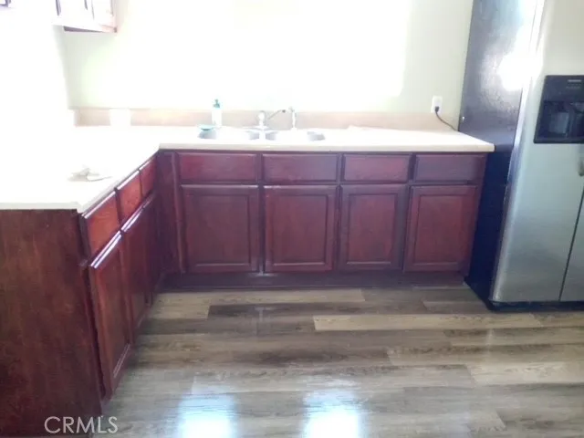 a bathroom with a sink vanity and mirror