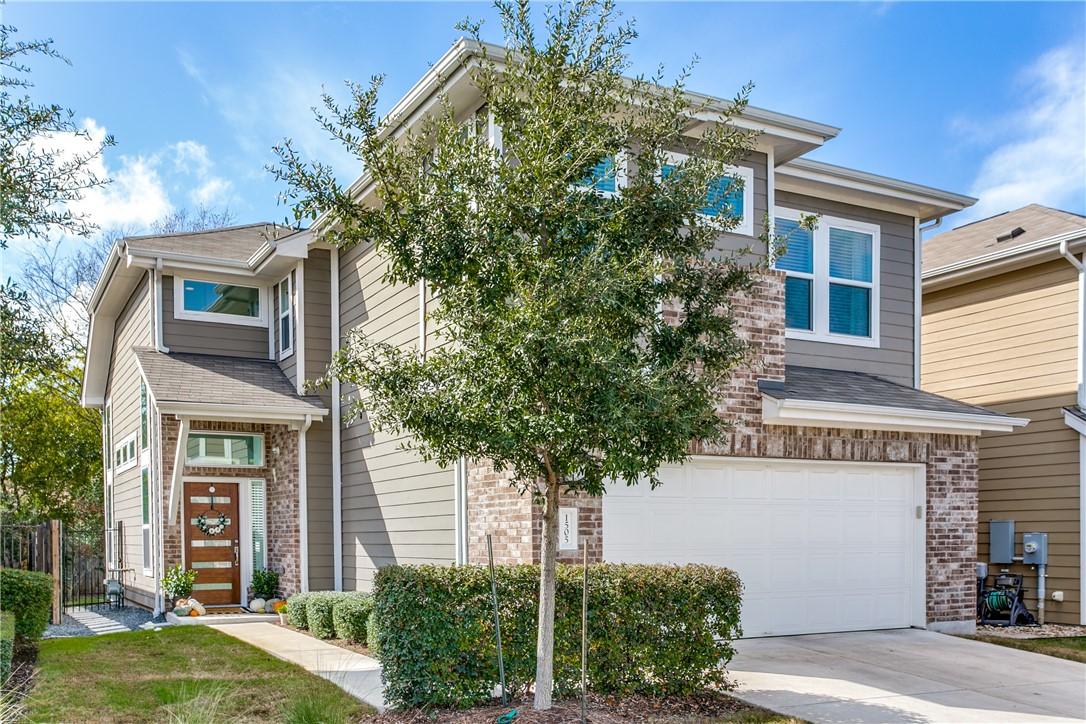 1505 Homespun Road Austin, TX 78745 - Photo 1 of 1 front view of a house with a yard