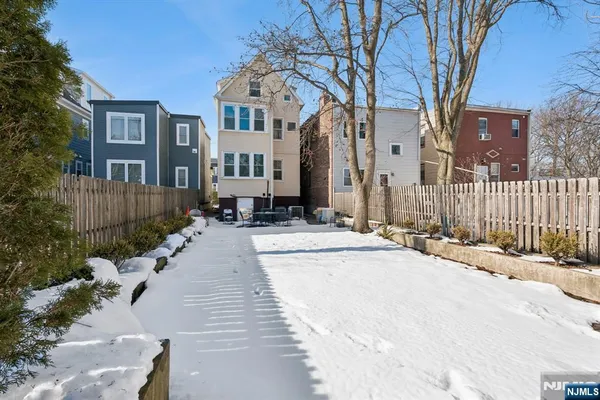a view of a building with a yard