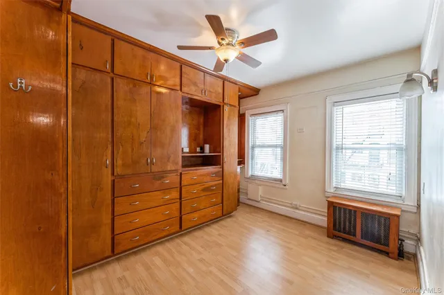 a room with window and furniture