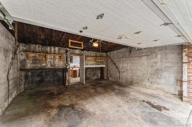 a view of a room with a fireplace