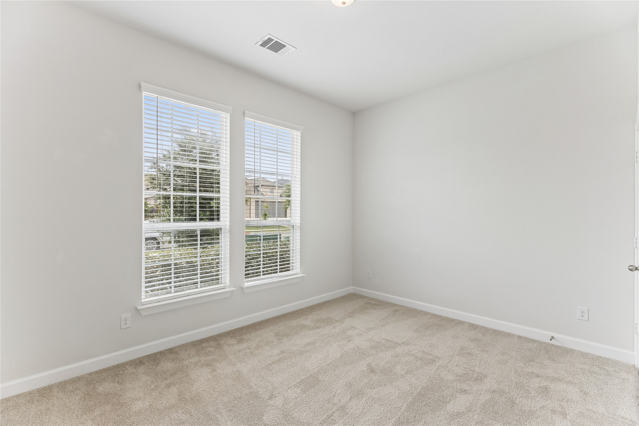 298 Wild Pecan Loop Buda, TX 78610 - Photo 30 of 40 an empty room with a window