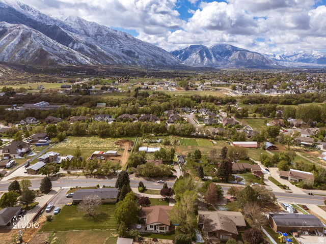 2672 East Canyon Road Springville, UT 84663 - Photo 19 of 33 Aerial perspective of suburban area featuring a mountainous background