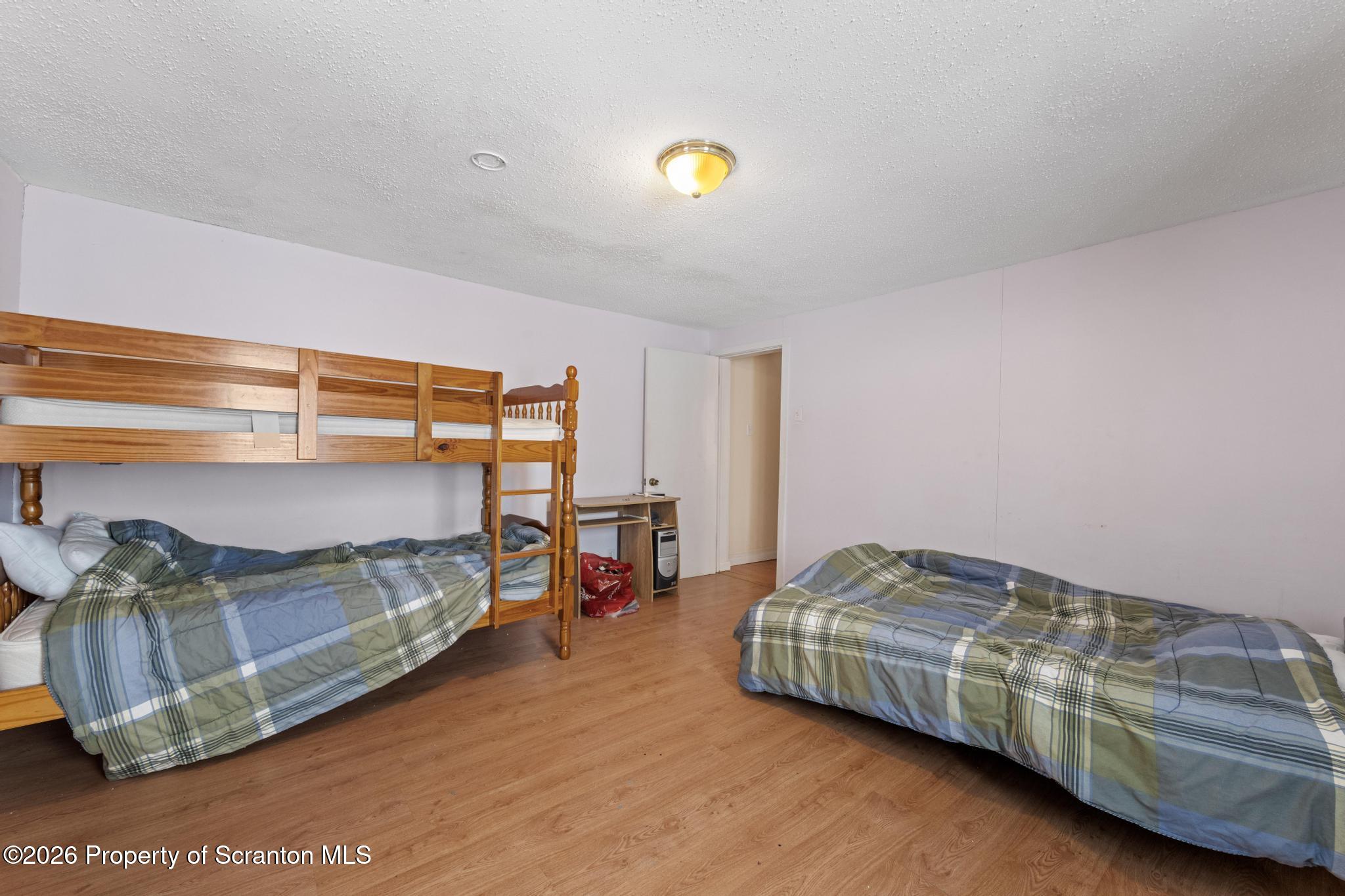 812 Old Street Hazleton, PA 18202 - Photo 12 of 29 a bedroom with a bed and a window