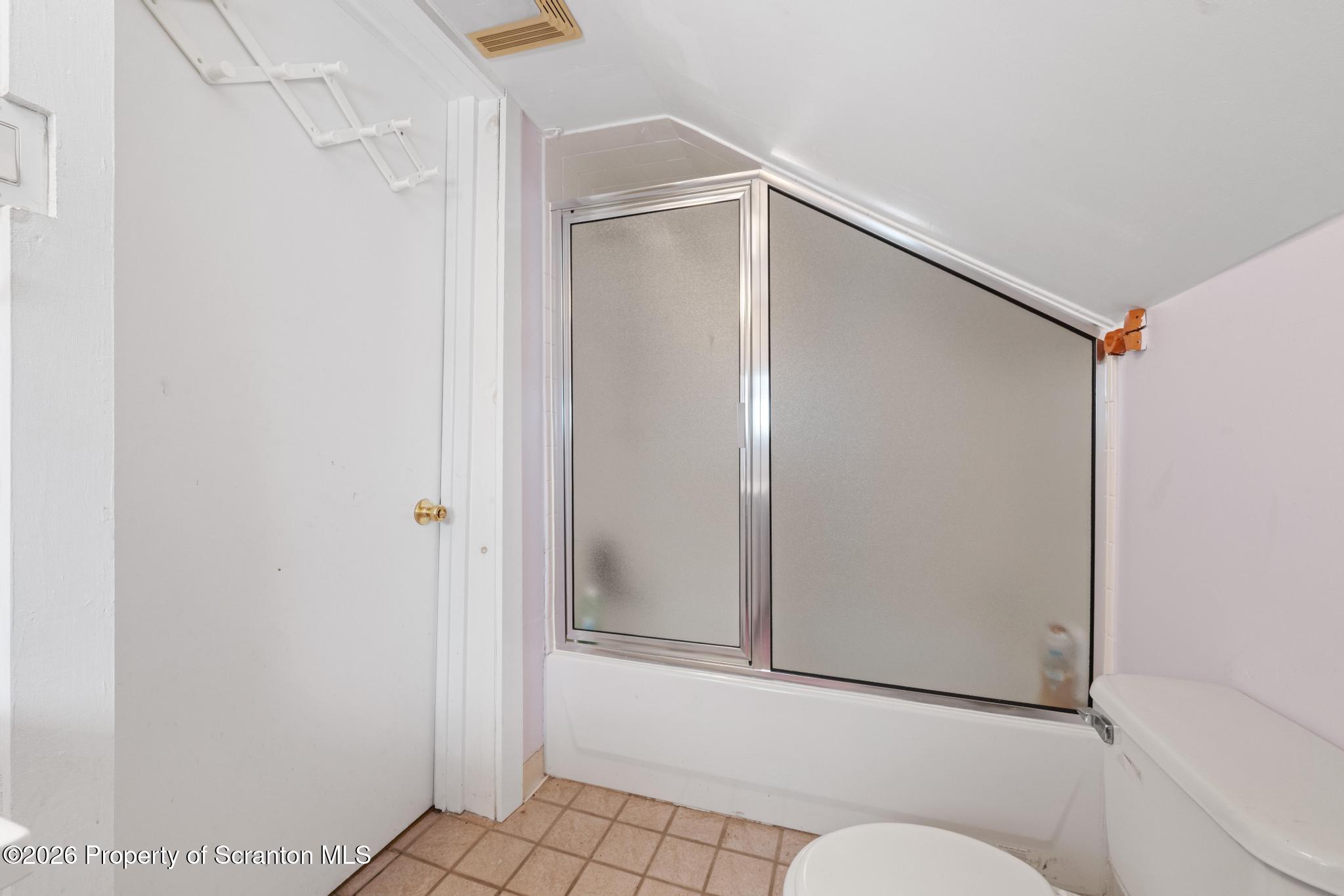 812 Old Street Hazleton, PA 18202 - Photo 20 of 29 a bathroom with a shower and a toilet