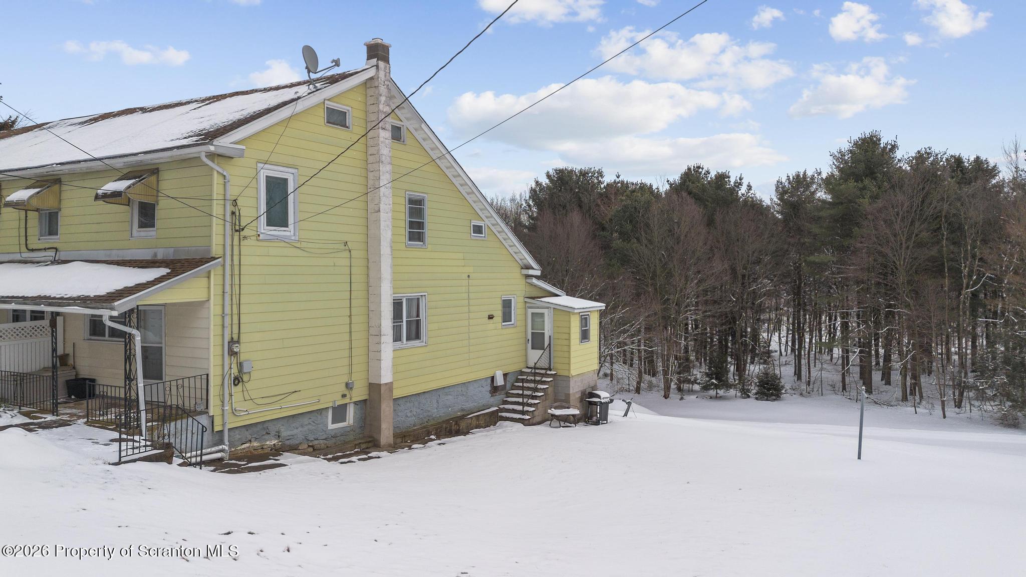 812 Old Street Hazleton, PA 18202 - Photo 26 of 29 a view of a house with a patio