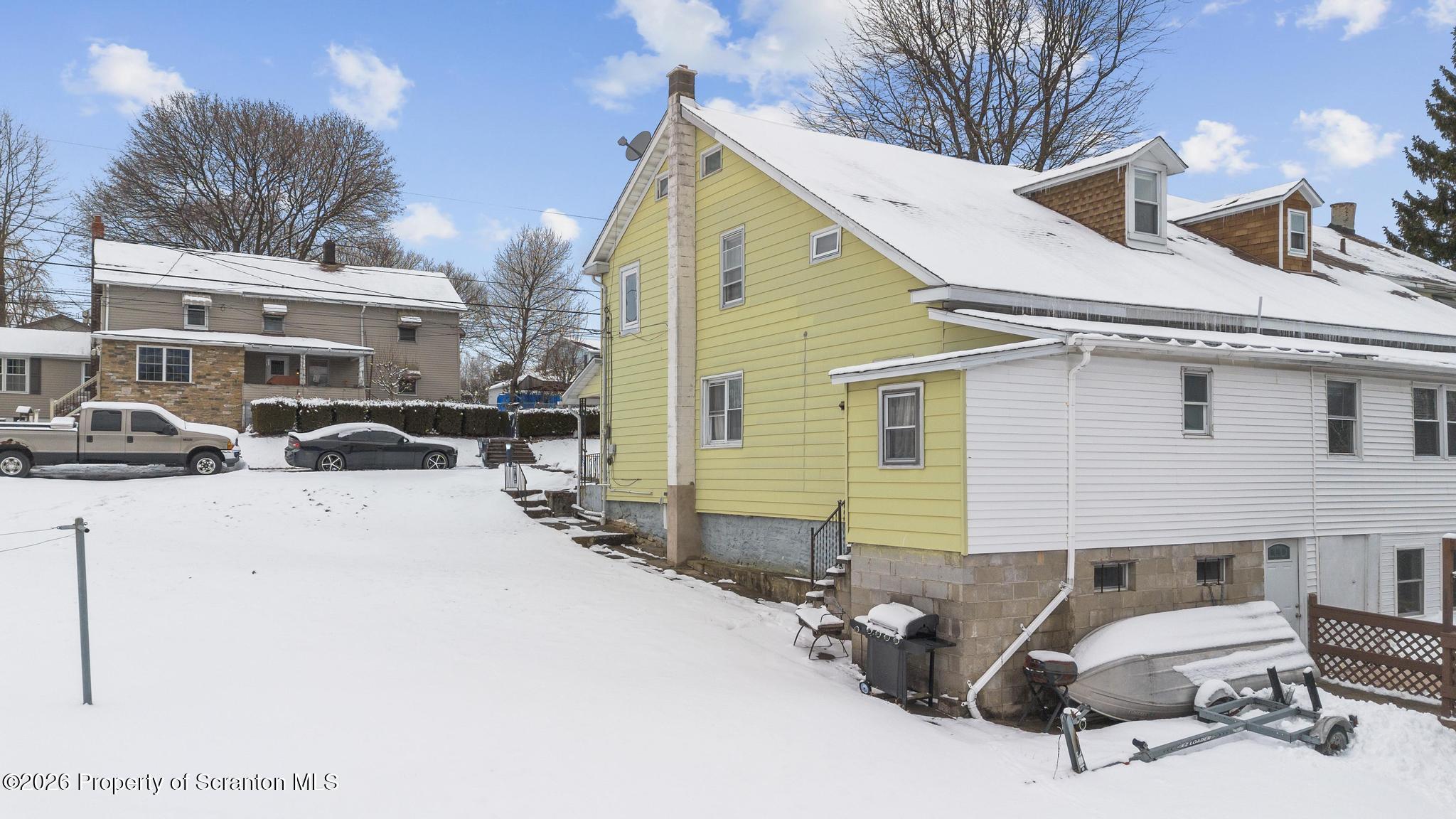 812 Old Street Hazleton, PA 18202 - Photo 28 of 29 a view of a terrace with chairs and a barbeque