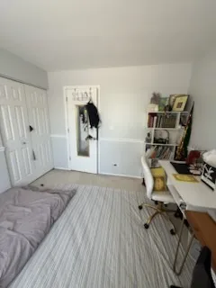 a view of workspace with wooden floor