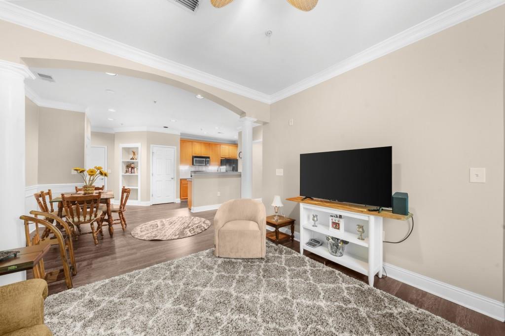 2103 Stratford Commons, Unit 2103 Decatur, GA 30033 - Photo 13 of 32 a living room with furniture and a flat screen tv