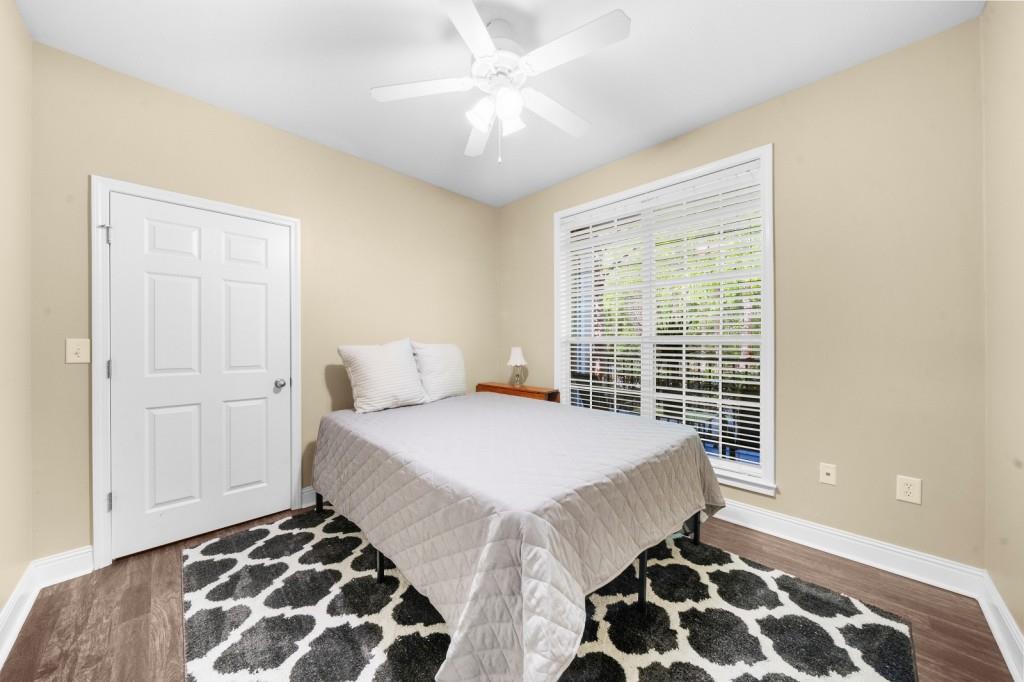 2103 Stratford Commons, Unit 2103 Decatur, GA 30033 - Photo 16 of 32 a bedroom with a bed and a window