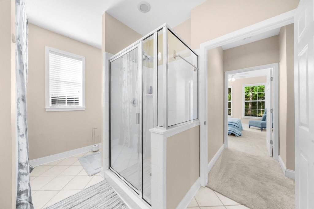 2103 Stratford Commons, Unit 2103 Decatur, GA 30033 - Photo 18 of 32 a bathroom with a shower and a tub