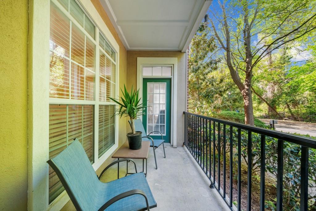 2103 Stratford Commons, Unit 2103 Decatur, GA 30033 - Photo 20 of 32 a view of a balcony with chairs