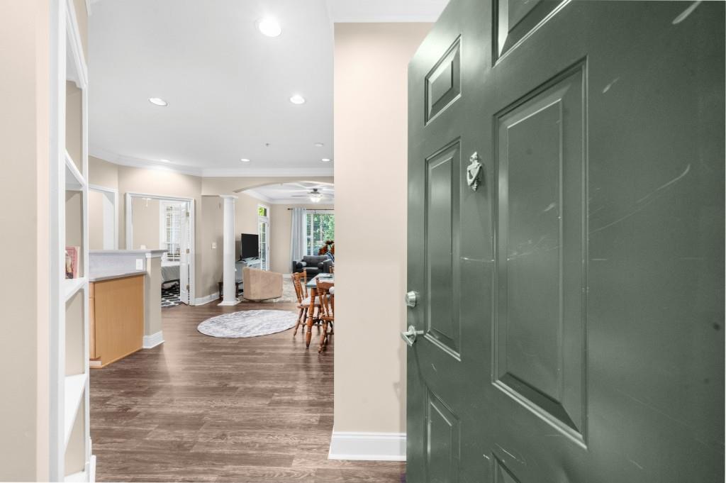 2103 Stratford Commons, Unit 2103 Decatur, GA 30033 - Photo 23 of 32 a view of a hallway view with wooden floor and living room