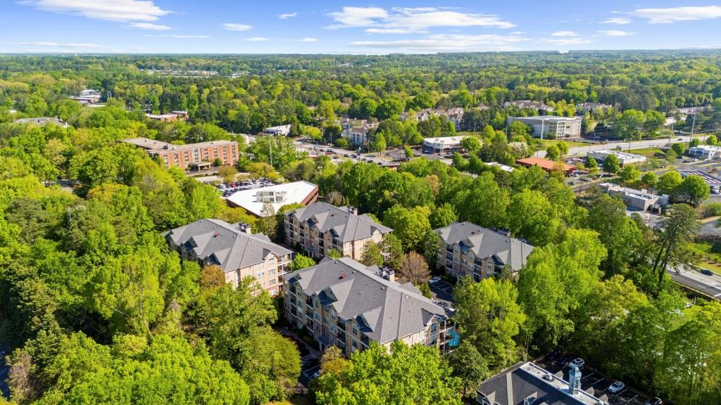 2103 Stratford Commons, Unit 2103 Decatur, GA 30033 - Photo 32 of 32 an aerial view of residential houses with outdoor space and trees