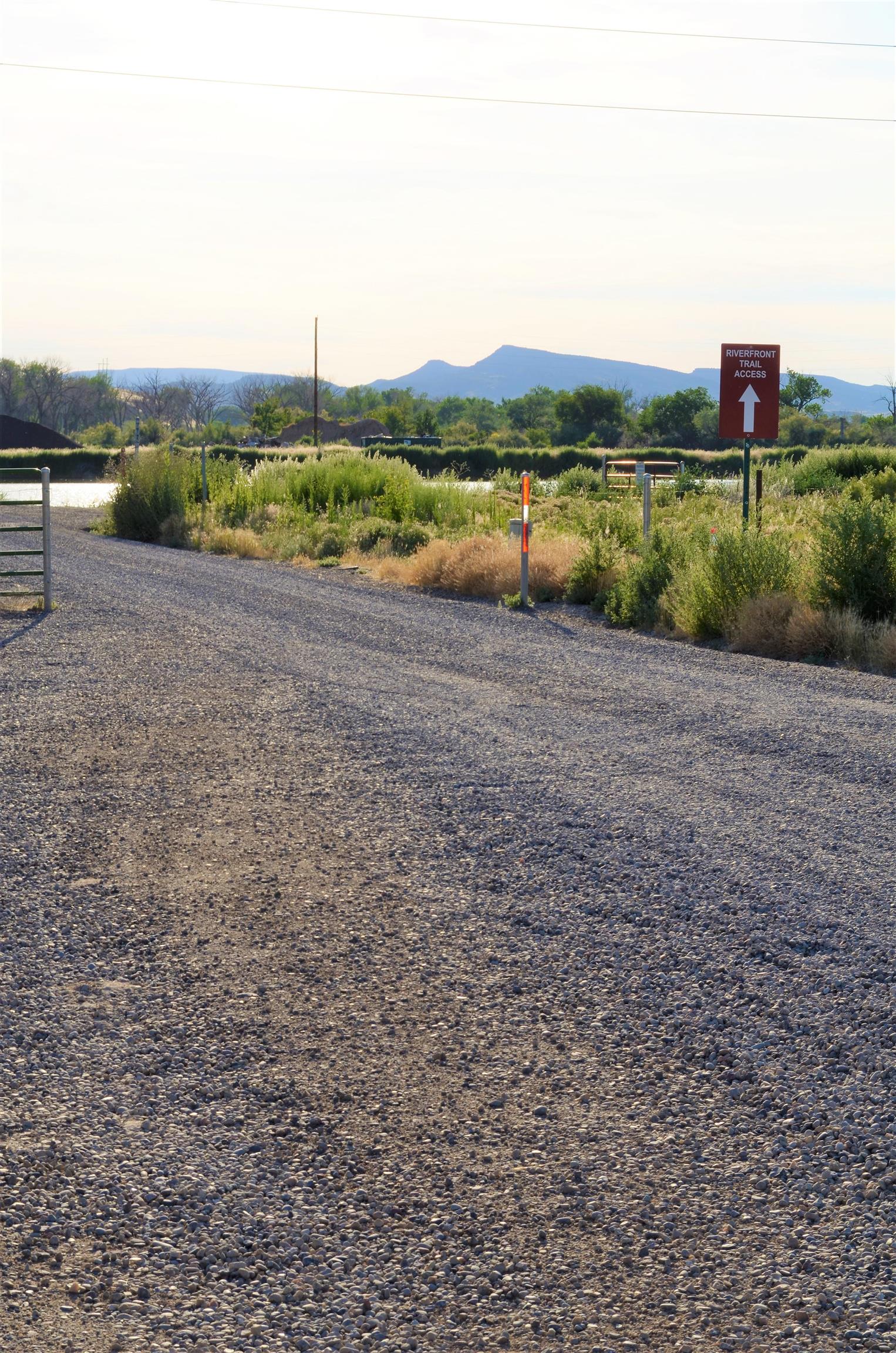 853 Raptor Road Fruita, CO 81521 - Photo 12 of 17 a view of a lake with a mountain