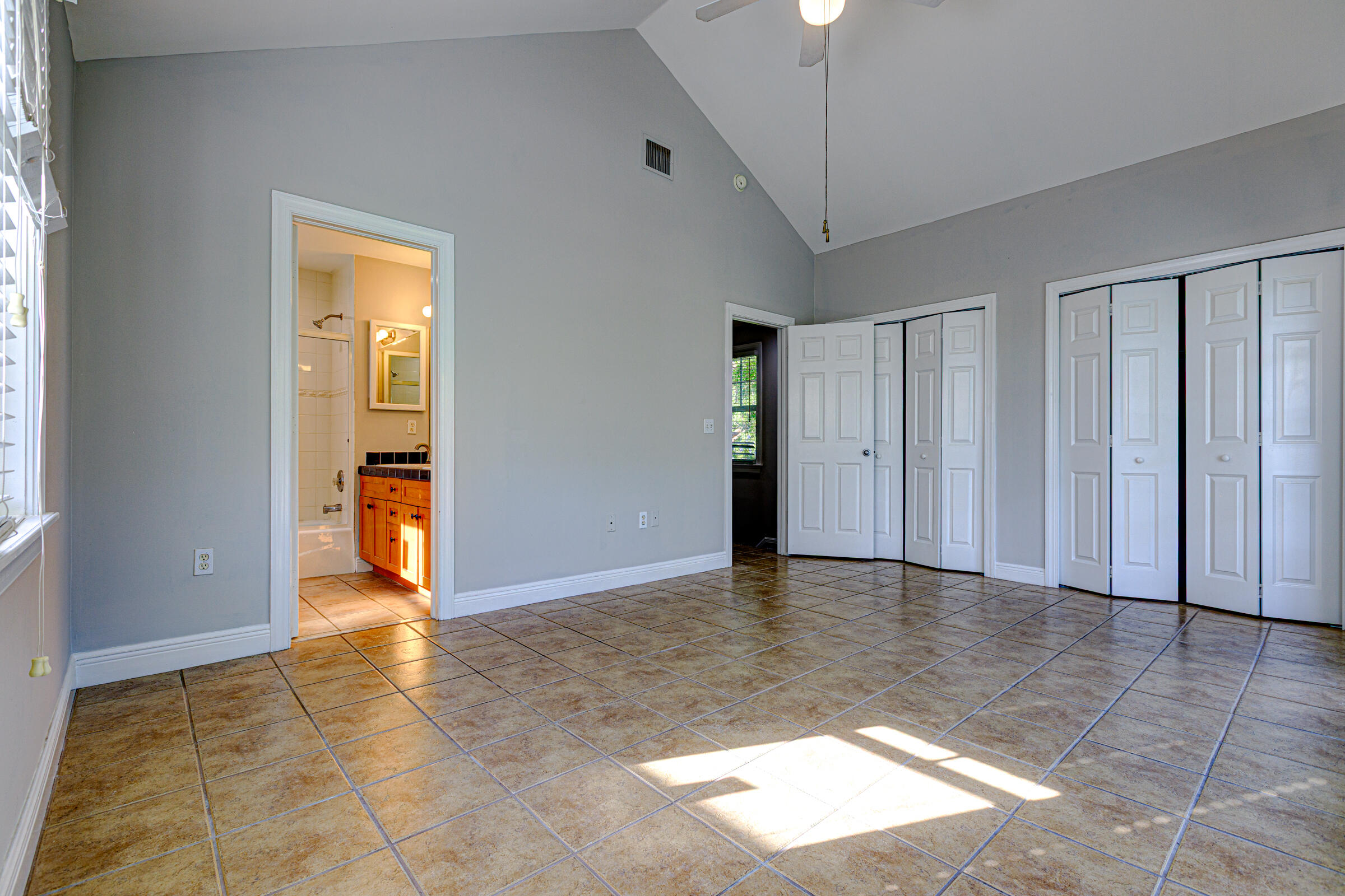 263 Golf Club Drive Key West, FL 33040 - Photo 17 of 30 a view of an empty room with closet and a window