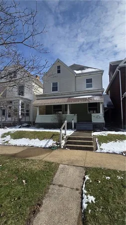 a view of house with outdoor space
