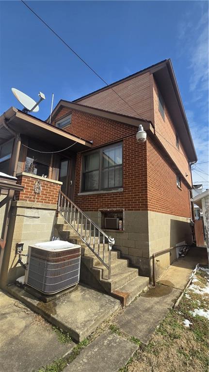122 Hamilton Avenue Vandergrift, PA 15690 - Photo 2 of 13 a view of a house with a patio and a yard