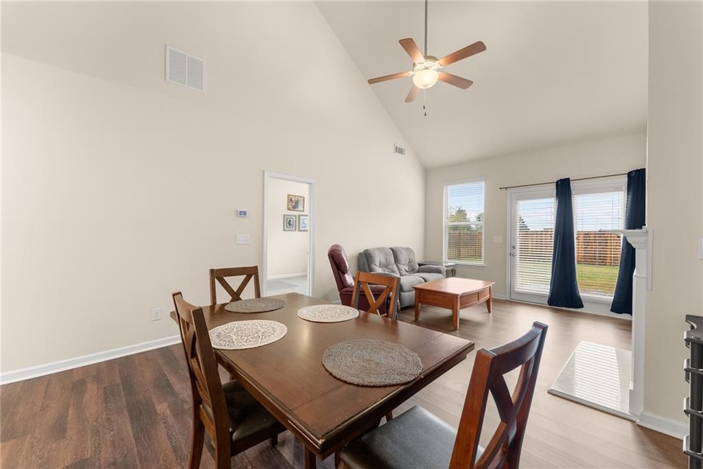 3914 Prospect Point Drive Oakwood, GA 30566 - Photo 11 of 30 a view of a dining room with furniture window and outside view