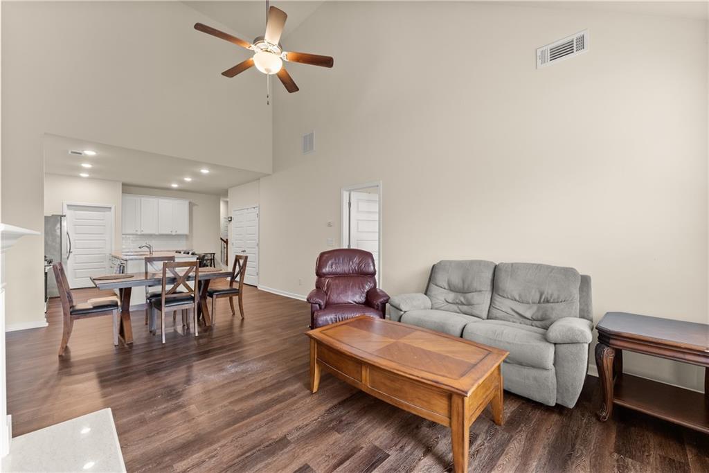 3914 Prospect Point Drive Oakwood, GA 30566 - Photo 13 of 30 a living room with furniture and wooden floor