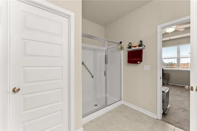 a bathroom with a sink double vanity and a mirror
