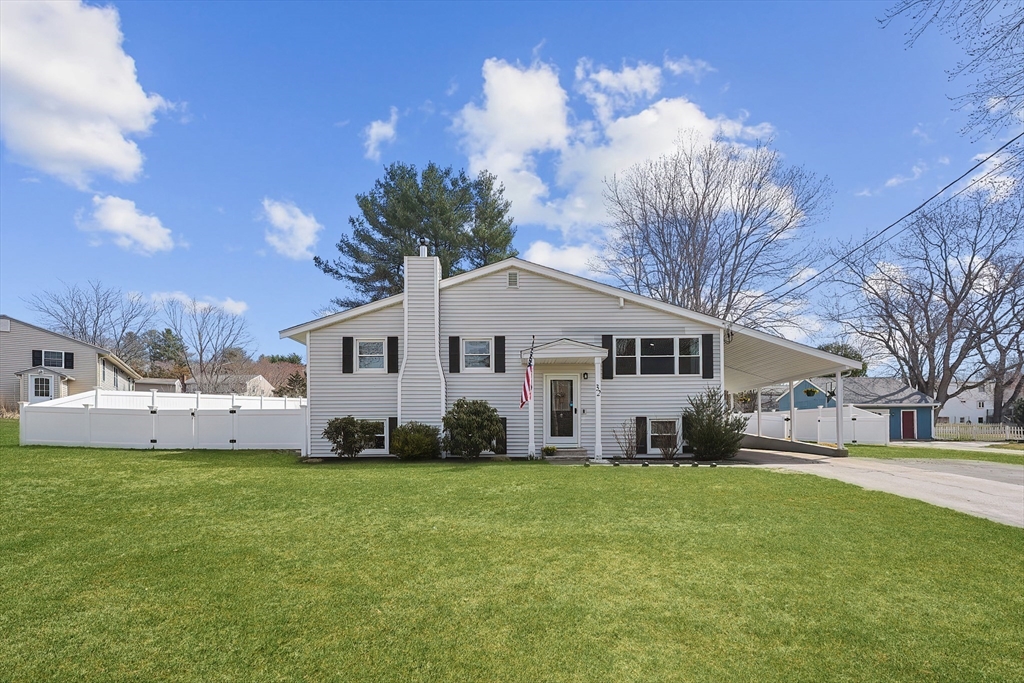 32 Anchorage Road Franklin, MA 02038 - Photo 1 of 32 a front view of a house with a yard and garage