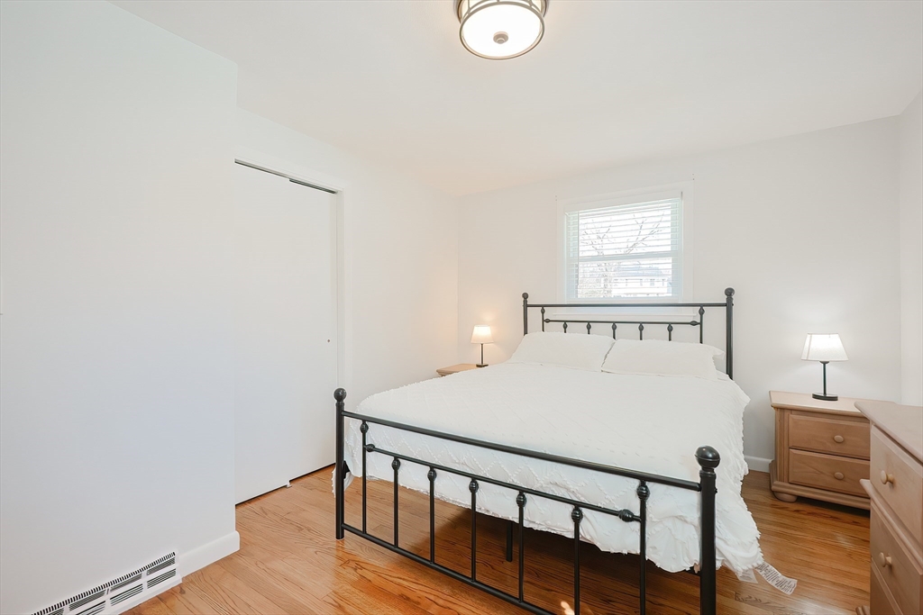 32 Anchorage Road Franklin, MA 02038 - Photo 13 of 32 a large bed sitting in a bedroom next to a window