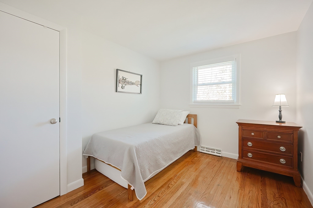 32 Anchorage Road Franklin, MA 02038 - Photo 15 of 32 a bedroom with a bed and a window