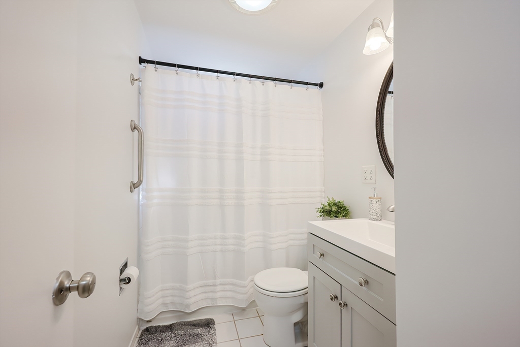 32 Anchorage Road Franklin, MA 02038 - Photo 16 of 32 a bathroom with a sink toilet and shower
