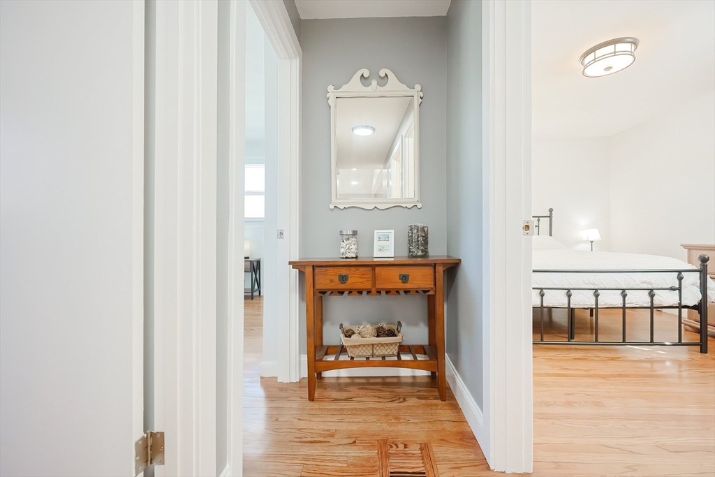 32 Anchorage Road Franklin, MA 02038 - Photo 18 of 32 a view of a hallway with a livingroom and furniture