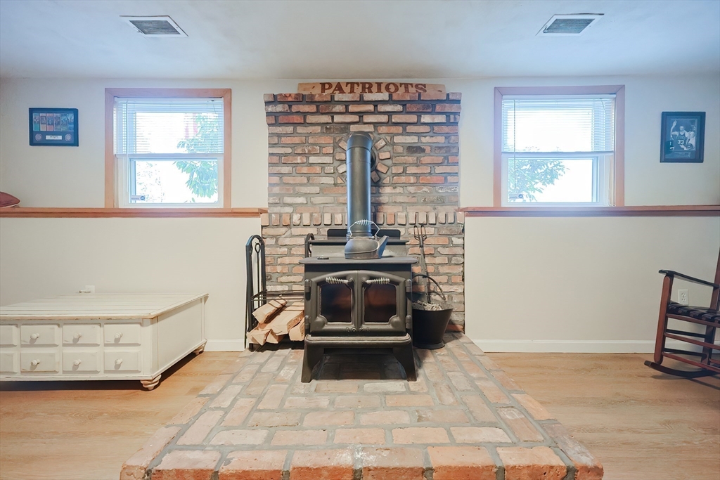 32 Anchorage Road Franklin, MA 02038 - Photo 22 of 32 a living room with furniture and a window