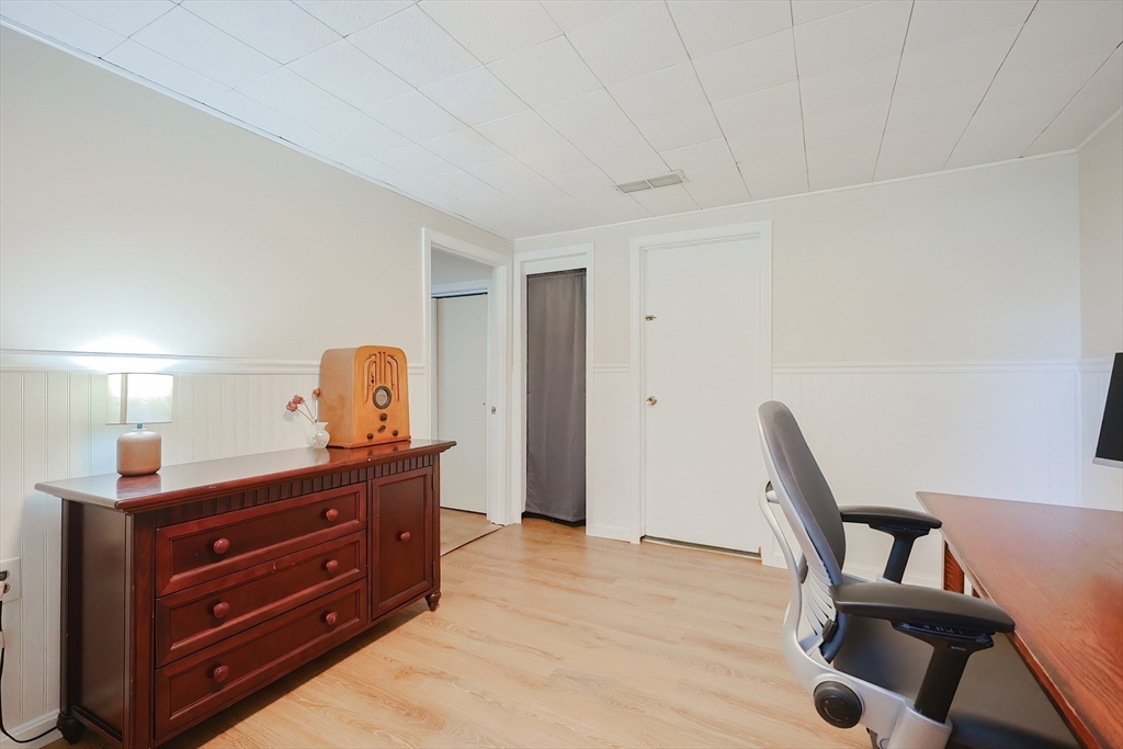 32 Anchorage Road Franklin, MA 02038 - Photo 23 of 32 a bed room with a bed and a chair