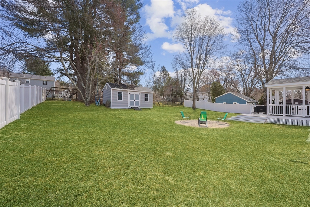 32 Anchorage Road Franklin, MA 02038 - Photo 30 of 32 a view of a house with backyard and a tree
