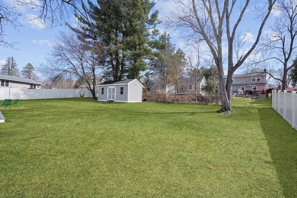 32 Anchorage Road Franklin, MA 02038 - Photo 31 of 32 a view of a trees with a yard