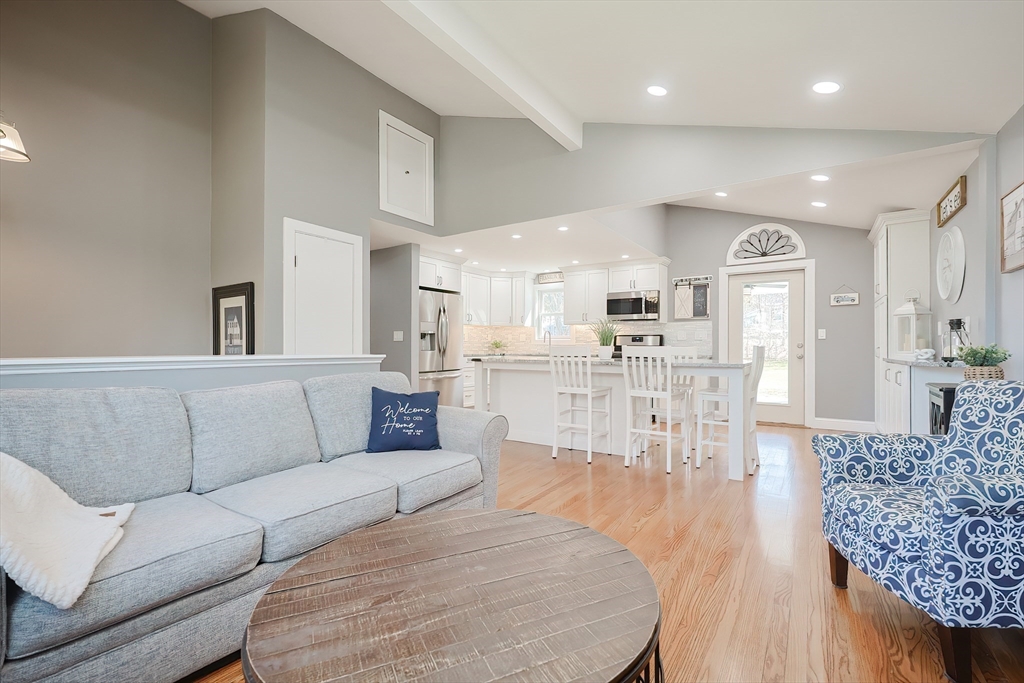 32 Anchorage Road Franklin, MA 02038 - Photo 10 of 32 a living room with furniture and kitchen view
