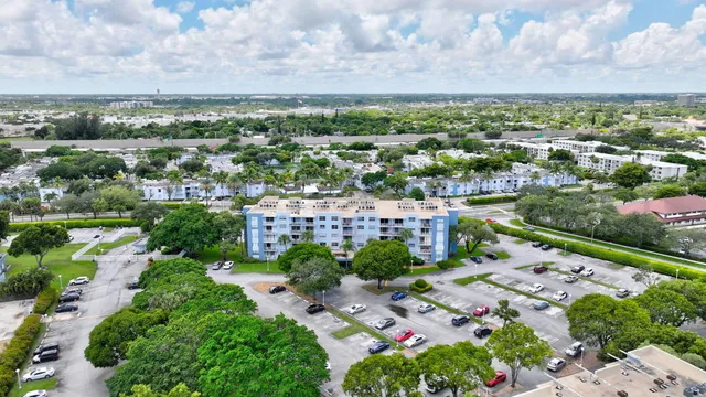 a view of building with swimming pool