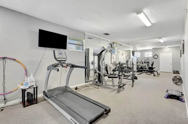 a view of a room with gym equipment