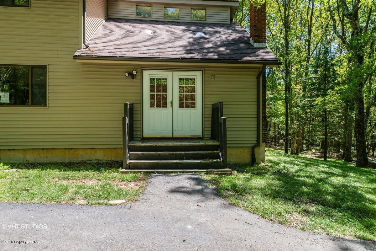 1186 Little Twig Road Effort, PA 18330 - Photo 4 of 24 a front view of a house with a garden
