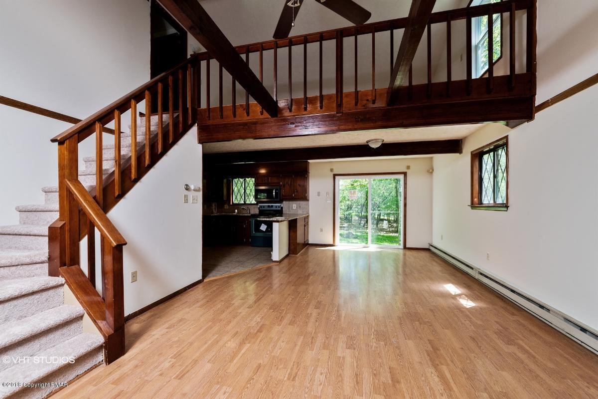 1186 Little Twig Road Effort, PA 18330 - Photo 9 of 24 a view of entryway with wooden floor and front door