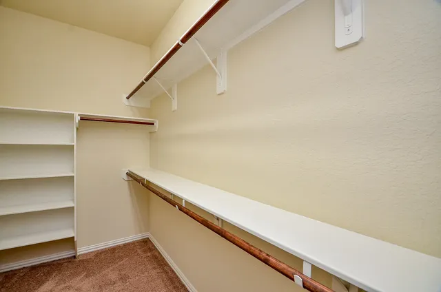 a view of a living room with windows