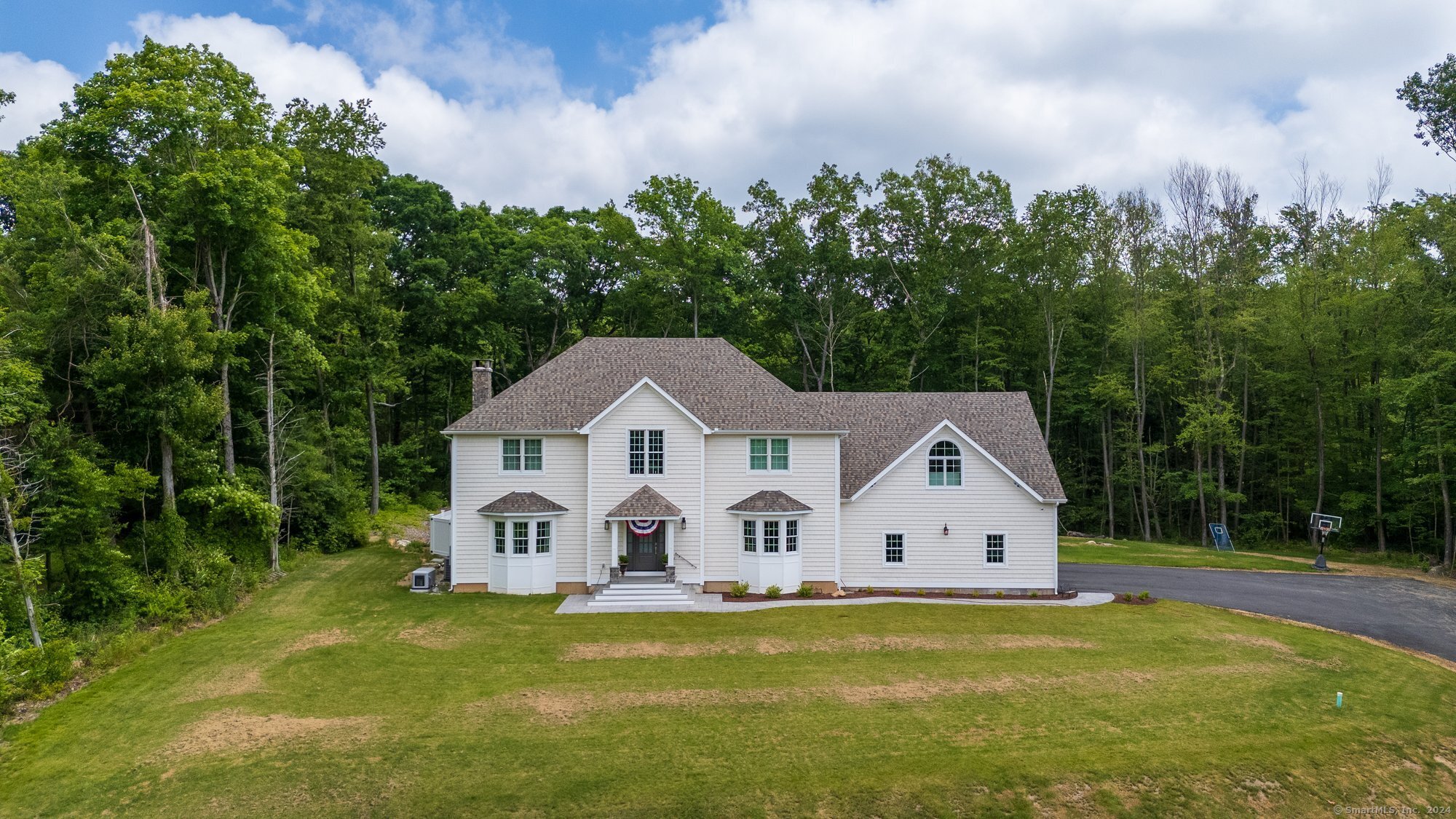 This newly constructed home sits on a hilltop on almost 6 acres!