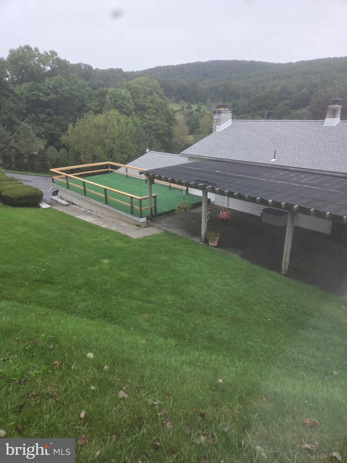 7620 Spring Road New Bloomfield, PA 17068 - Photo 40 of 45 REAR PORCH/NEW FLOOR COVERING