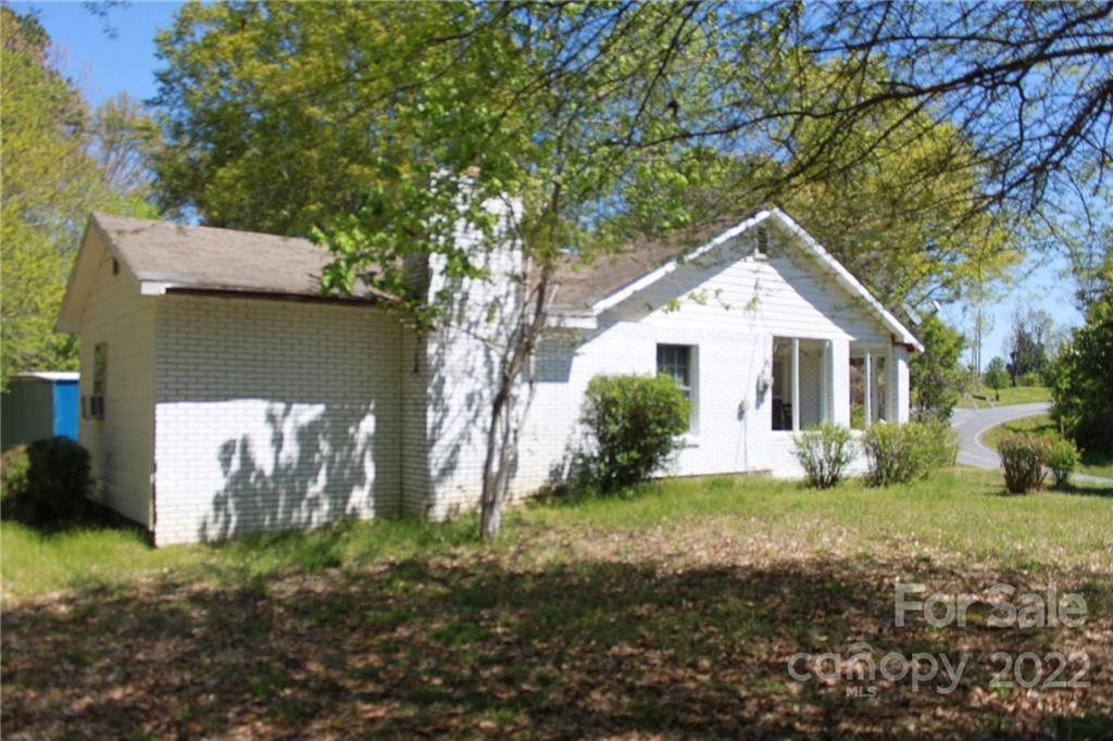 530 Edwards St Extension Rutherfordton, NC 28139 - Photo 15 of 48 a front view of a house with garden