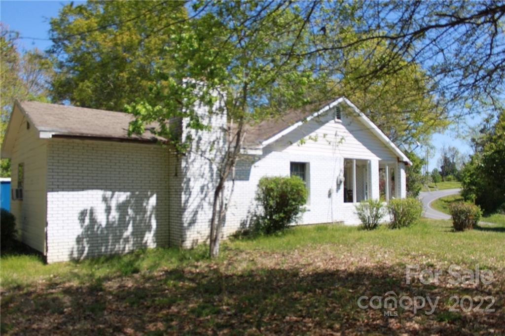 530 Edwards St Extension Rutherfordton, NC 28139 - Photo 3 of 48 a front view of a house with a yard