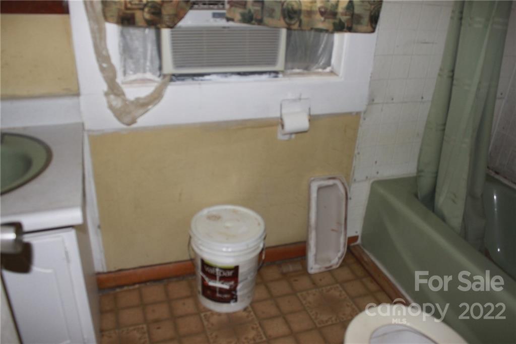 530 Edwards St Extension Rutherfordton, NC 28139 - Photo 39 of 48 a bathroom with a toilet and a sink