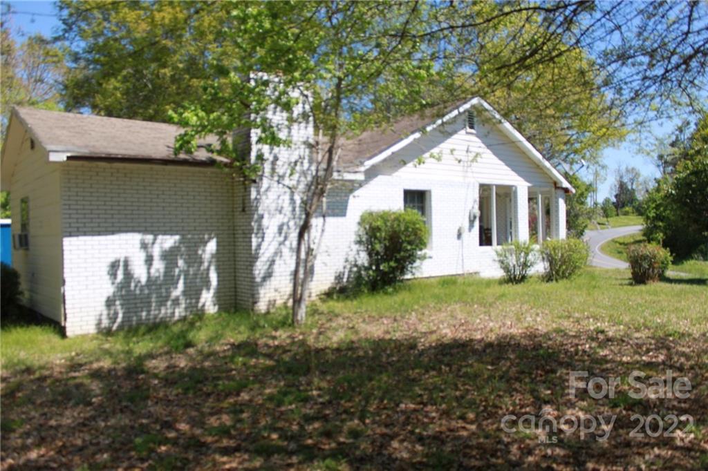 530 Edwards St Extension Rutherfordton, NC 28139 - Photo 4 of 48 a view of a house with a yard and plants