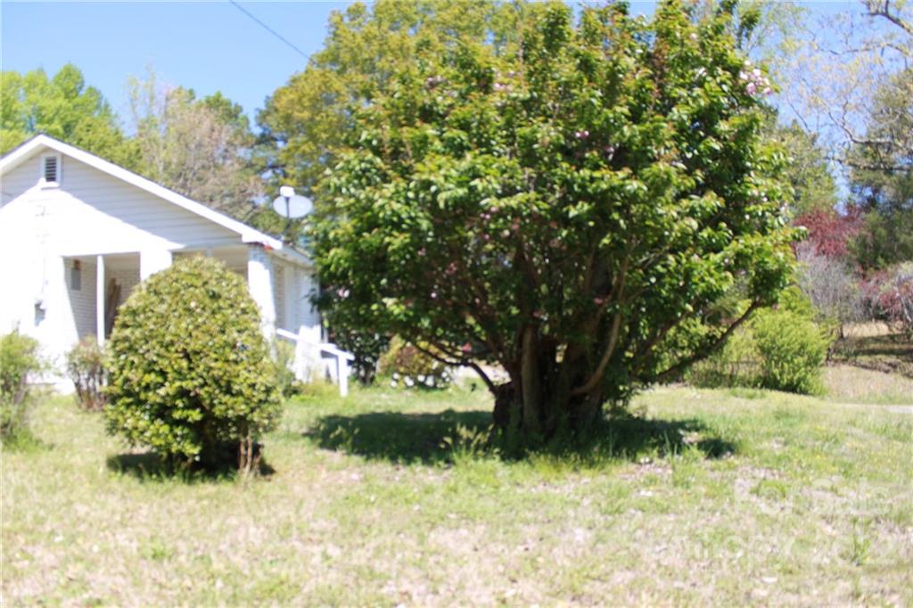 530 Edwards St Extension Rutherfordton, NC 28139 - Photo 41 of 48 a view of backyard with plants and a lake view