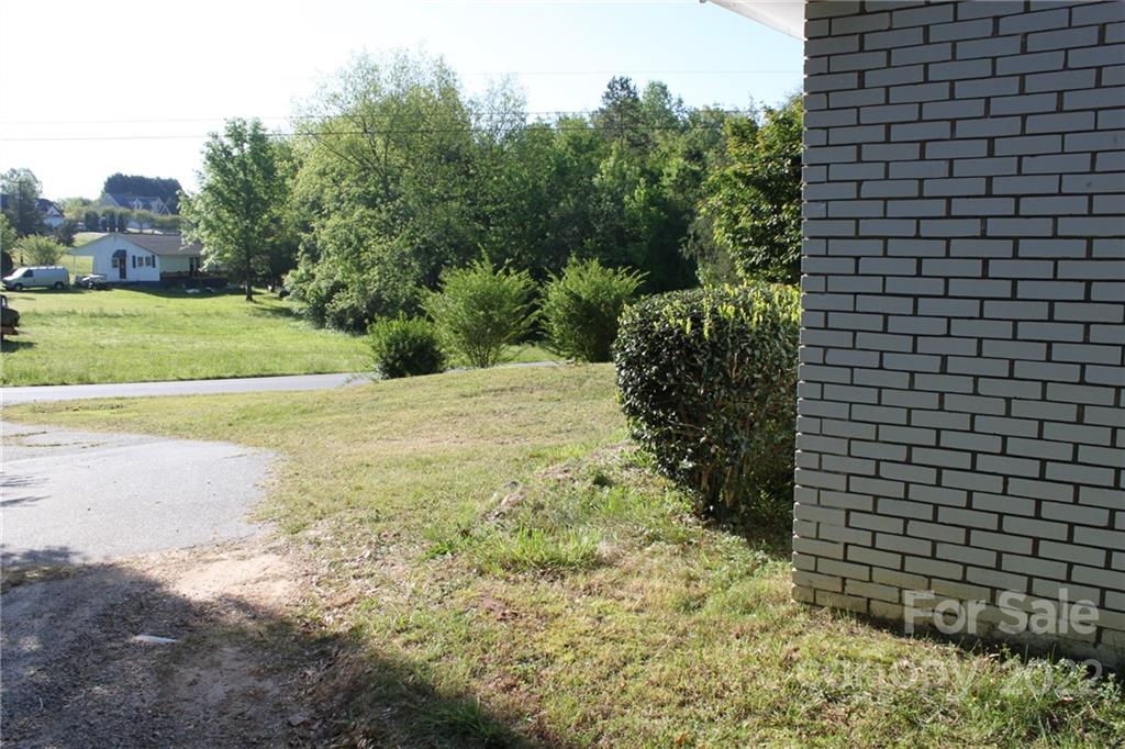 530 Edwards St Extension Rutherfordton, NC 28139 - Photo 47 of 48 a view of a yard with plants and large trees