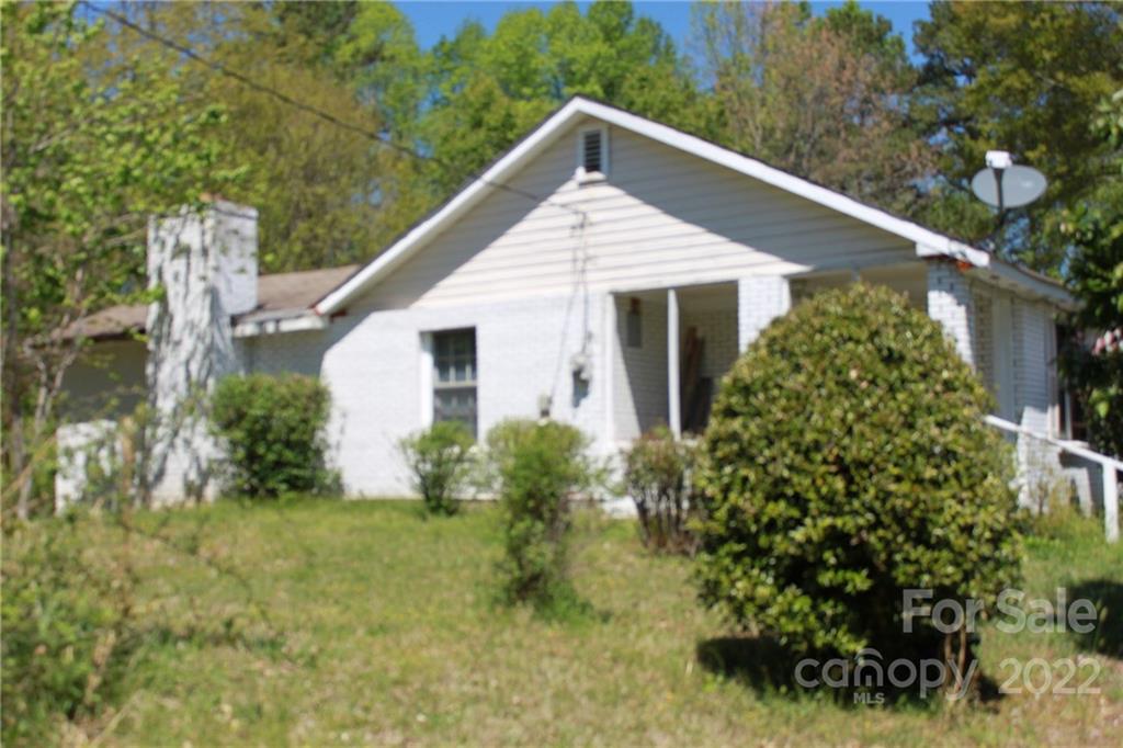 530 Edwards St Extension Rutherfordton, NC 28139 - Photo 5 of 48 a view of a house with a yard and plants