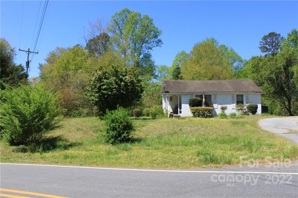 530 Edwards St Extension Rutherfordton, NC 28139 - Photo 6 of 48 a front view of a house with garden